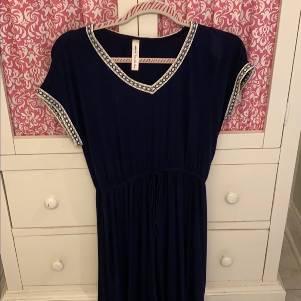 navy dress with neckline and sleeve detailing